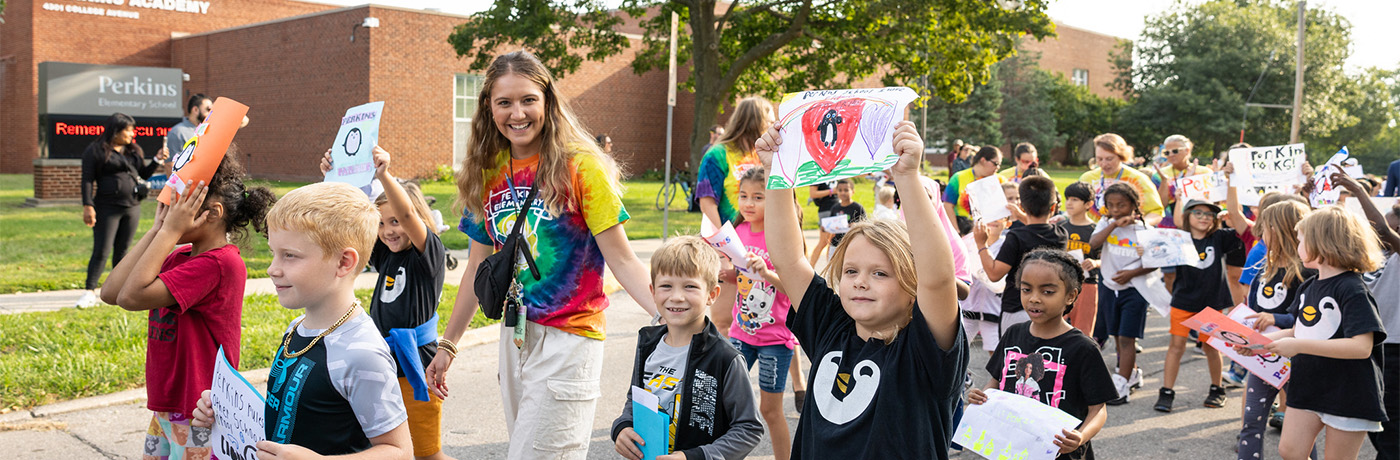 students marching in a parade